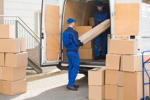 Removal van and moving boxes for a Guildford flat move