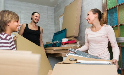 Student removals in Guildford with boxes and moving van preparation