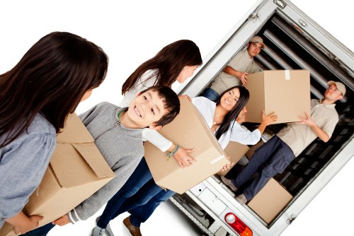 Flat removals planning in Guildford with moving boxes and access arrangements