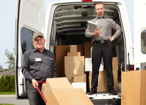Removal team loading household items for a UK move