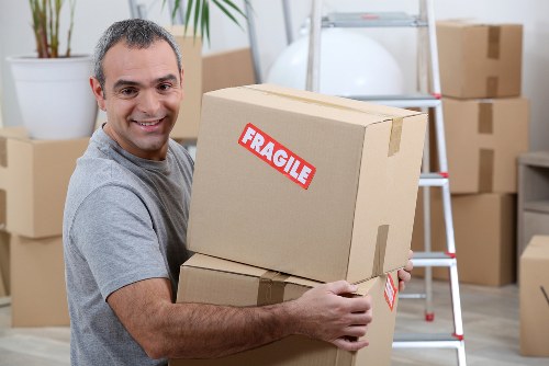 Removal van and moving boxes in Guildford