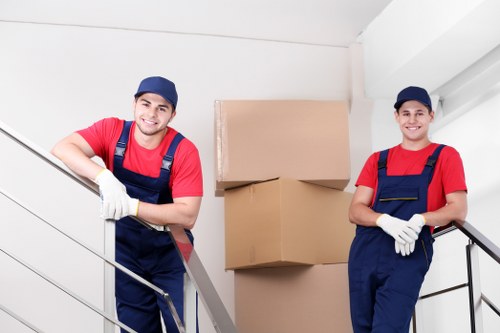 Manager reviewing complaint details in a removals company