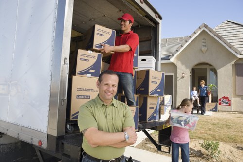 Packing and wrapping household items for a Guildford move