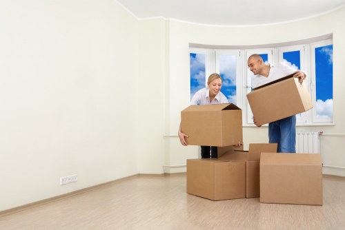 Sturdy packing boxes arranged for home moving in Guildford