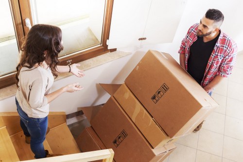 Packed office boxes and business equipment prepared for commercial moves