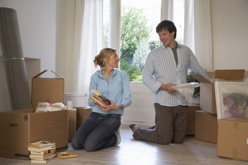 Preparing apartment items for flat removals in Guildford with careful packing